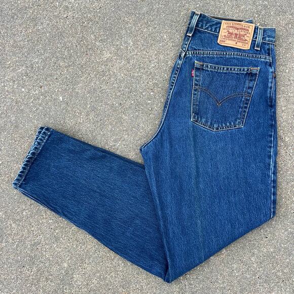 Vintage 90s Levi’s 550 relaxed fit tapered leg mom jeans Ladies 14 REG LONG